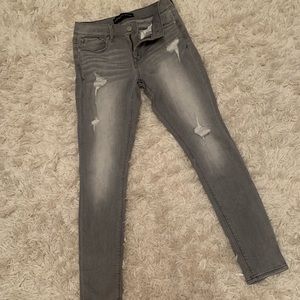 Grey distressed jean leggings
